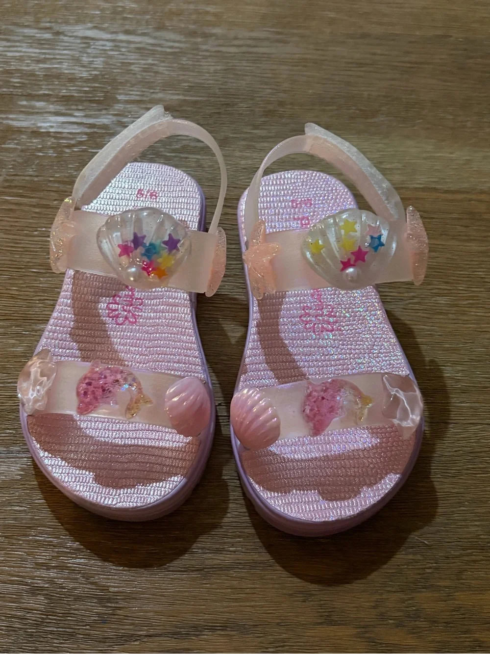 Girls Pink Jelly Sandals with Sea Charm Embellishments